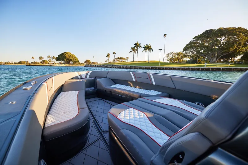 Slide: The Image of Luxurious interior of 2020 Midnight Express 37 Open boat with scenic waterfront view. - 10