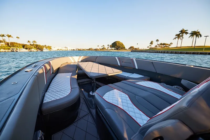 Slide: The Image of Luxurious seating on a 2020 Midnight Express 37 Open boat, cruising in a scenic waterway. - 11