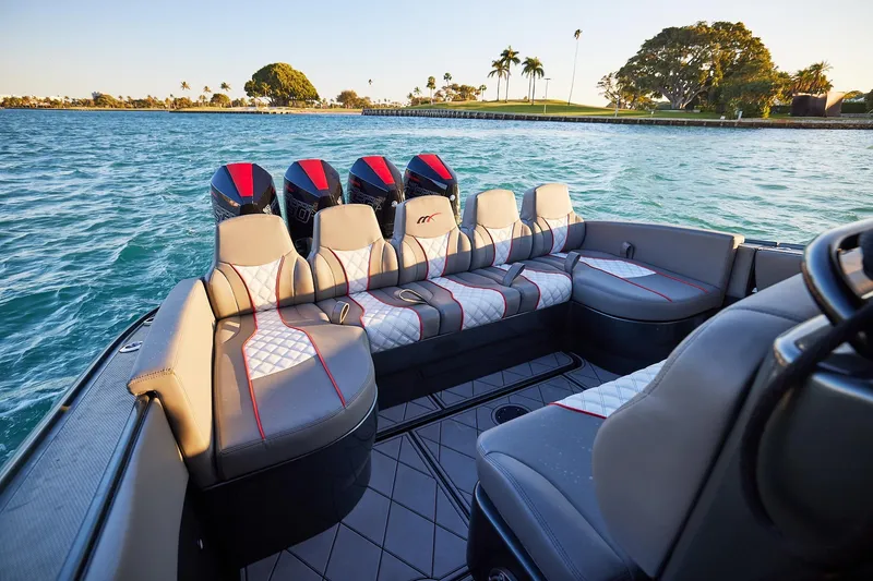 Slide: The Image of 2020 Midnight Express 37 Open boat interior with luxurious seating and scenic water view. - 17