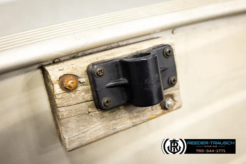 Slide: The Image of Close-up of a 1999 Tracker Pro Deep V-16 boat's mounting bracket detail. - 20