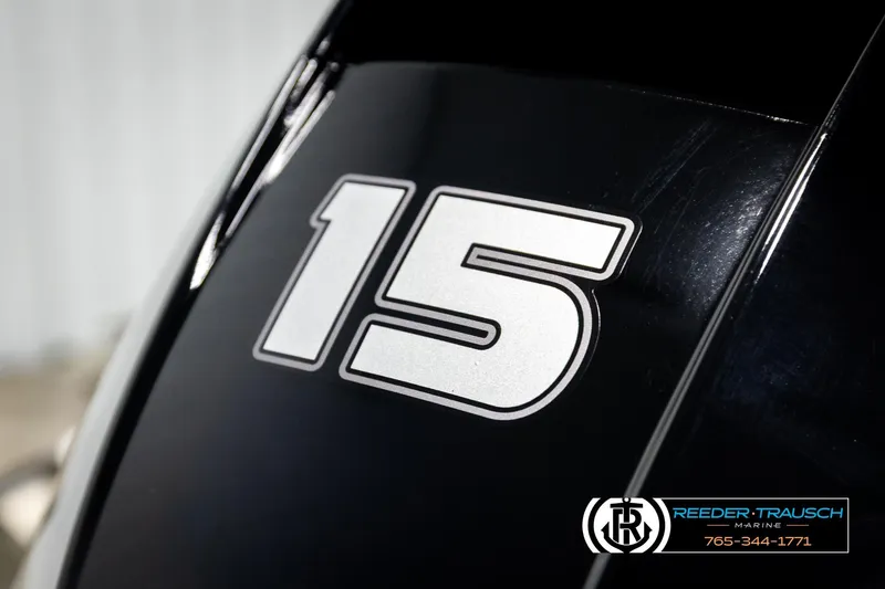 Slide: The Image of 1999 Tracker Pro Deep V-16 boat with number 15 decal, Reeder-Trausch Marine logo. - 24