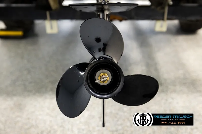 Slide: The Image of Close-up of a black propeller from a 1999 Tracker Pro Deep V-16 boat. - 25