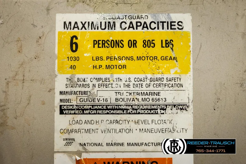 Slide: The Image of 1999 Tracker Pro Deep V-16 capacity label, 6 persons or 805 lbs, 40 HP motor. - 29