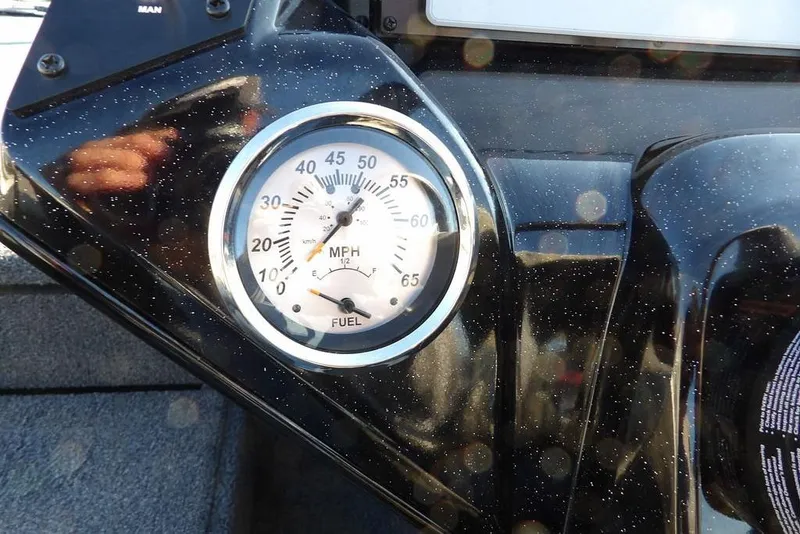 Slide: The Image of Dashboard of 2025 Crestliner XF 189 boat with speedometer and fuel gauge. - 20