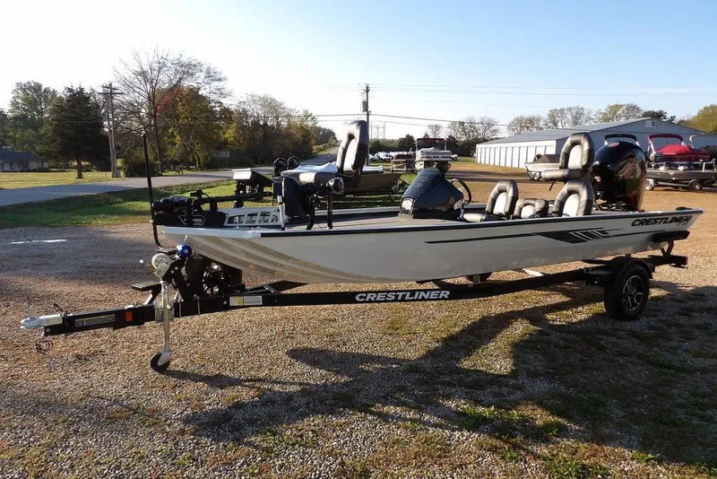 Slide: The Image of 2025 Crestliner XF 189 fishing boat on trailer in outdoor setting. - 3