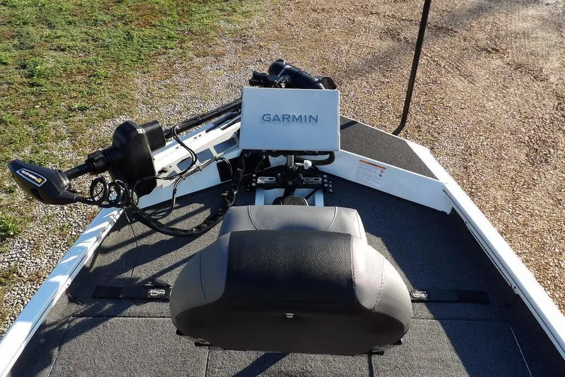 Slide: The Image of 2025 Crestliner XF 189 boat with Garmin navigation system and trolling motor. - 35