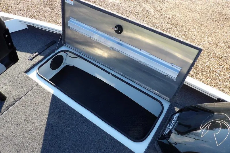 Slide: The Image of 2025 Crestliner XF 189 boat storage compartment with open lid, showcasing interior space. - 38