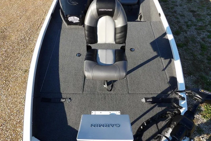 Slide: The Image of 2025 Crestliner XF 189 boat interior with Garmin equipment and seating. - 44