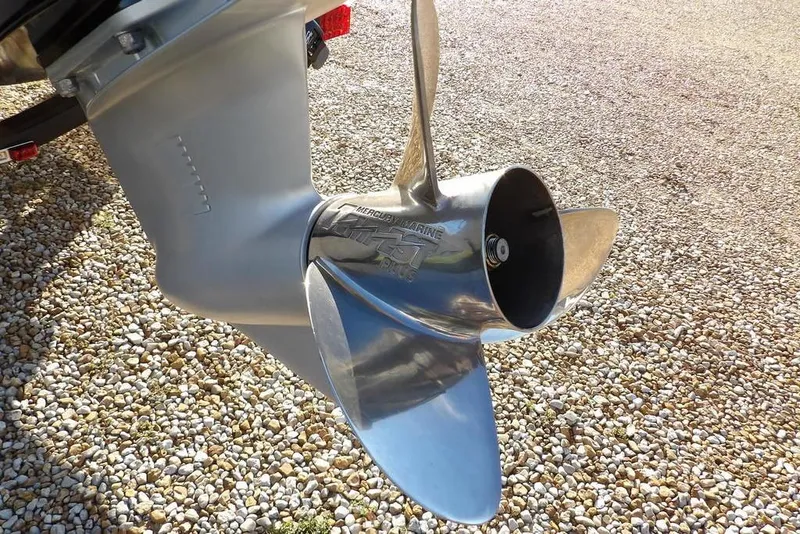 Slide: The Image of Propeller of 2025 Crestliner XF 189 boat on gravel surface. - 54