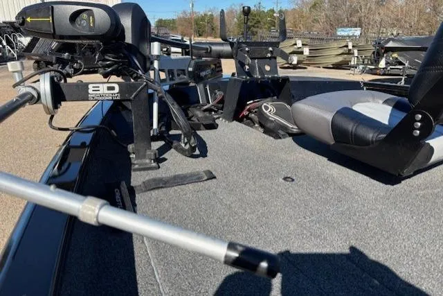 Slide: The Image of 2023 Crestliner XFC 189 boat interior with fishing equipment and seating. - 11