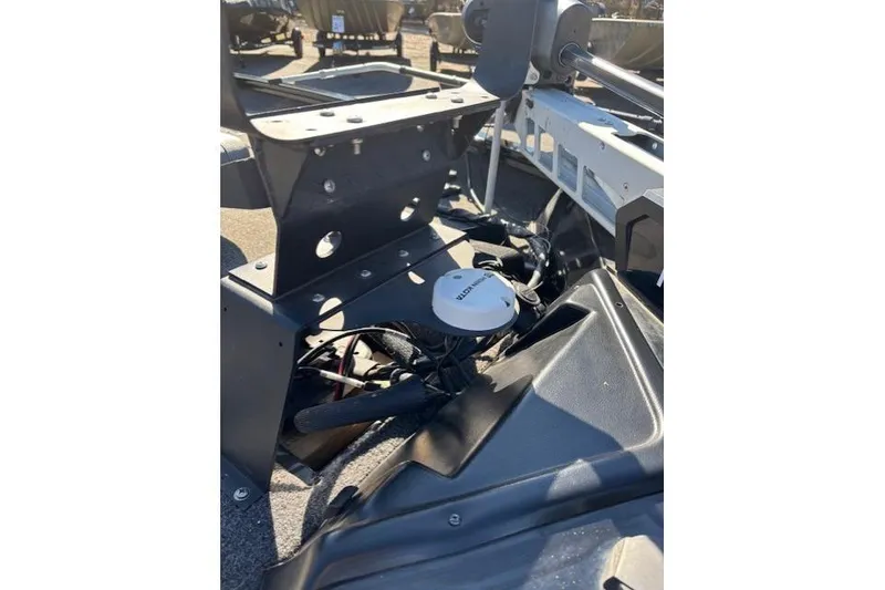 Slide: The Image of 2023 Crestliner XFC 189 boat interior with electronic components and wiring. - 15