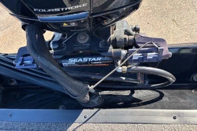 Slide: The Image of 2023 Crestliner XFC 189 boat engine with SeaStar hydraulic steering system. - 19