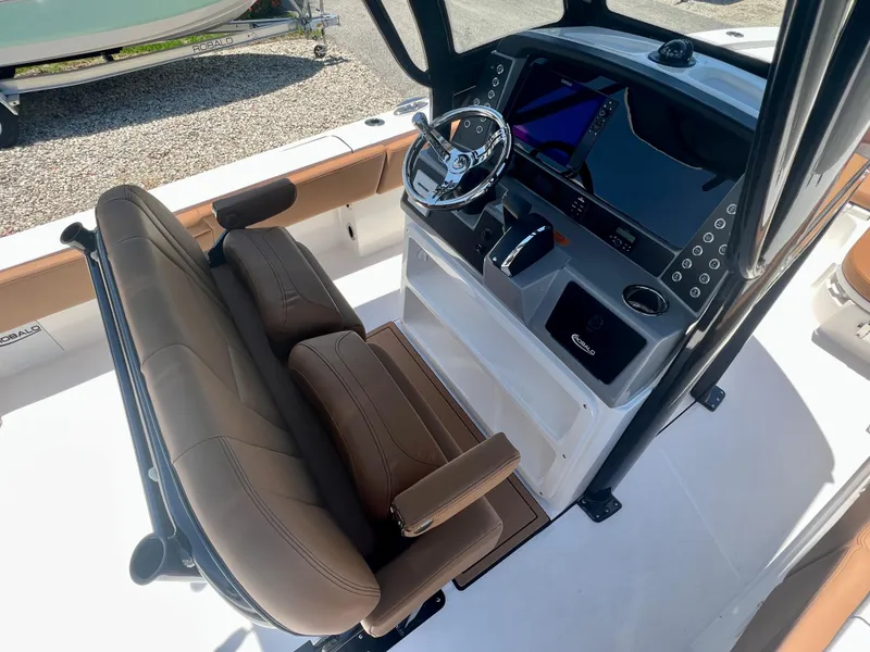 Slide: The Image of Interior view of 2025 Robalo 266 Cayman boat with helm console. - 15