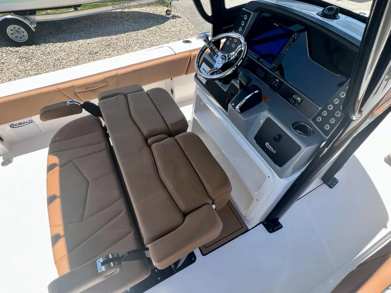 Slide: The Image of Interior view of 2025 Robalo 266 Cayman boat with helm console. - 16