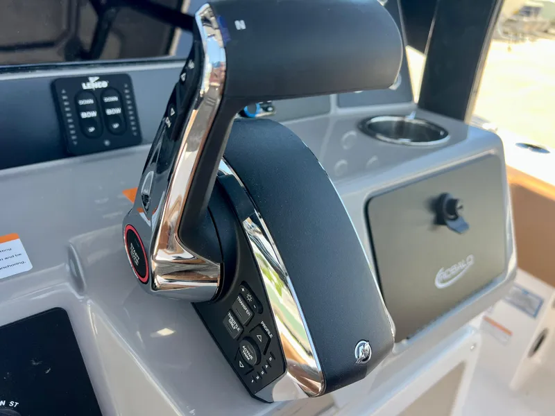 Slide: The Image of Close-up of throttle control on a 2025 Robalo 266 Cayman. - 20