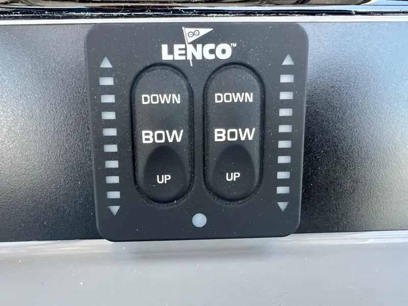 Slide: The Image of Lenco control panel for 2025 Robalo 266 Cayman, bow trim switch. - 21