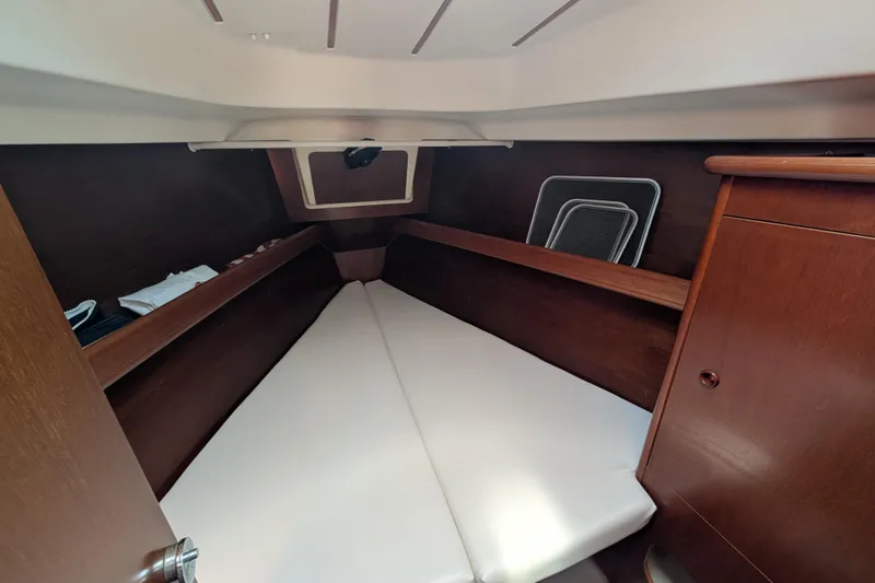 Slide: The Image of Cozy cabin interior of 1999 Beneteau Oceanis 361 sailboat with wooden finish. - 23