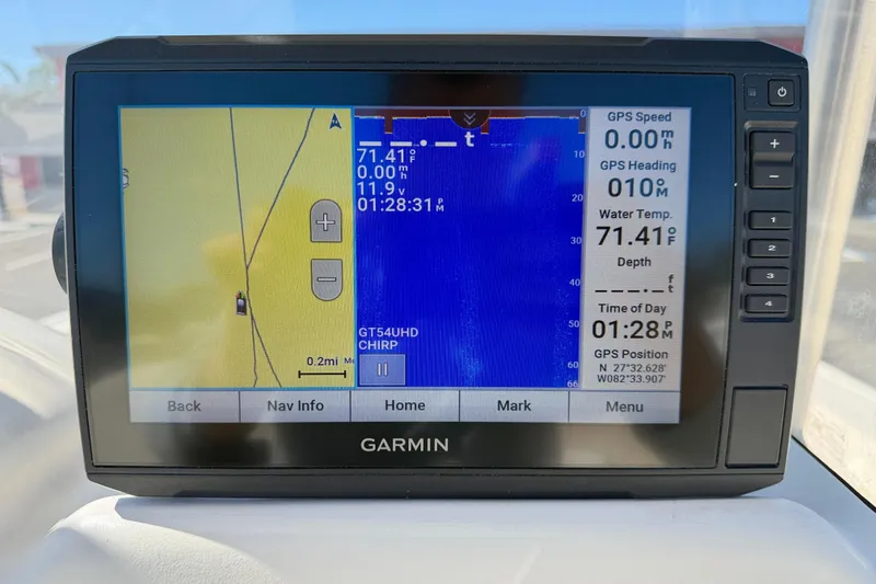 Slide: The Image of Garmin GPS display on 2014 Mako 184 Center Console, showing navigation and water temperature. - 16