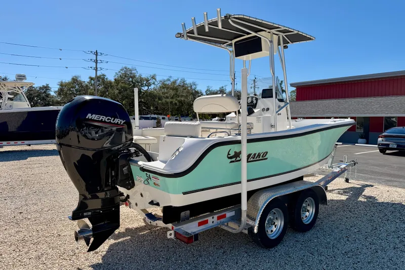 Slide: The Image of 2014 Mako 184 Center Console boat with Mercury engine on trailer. - 5