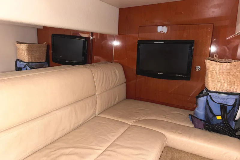 Slide: The Image of Interior of 2011 Formula 34 Performance Cruiser with beige seating and wall-mounted TV. - 15