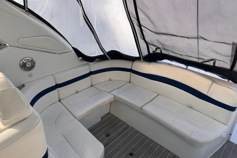 Slide: The Image of 2011 Formula 34 Performance Cruiser interior with white and blue seating. - 16