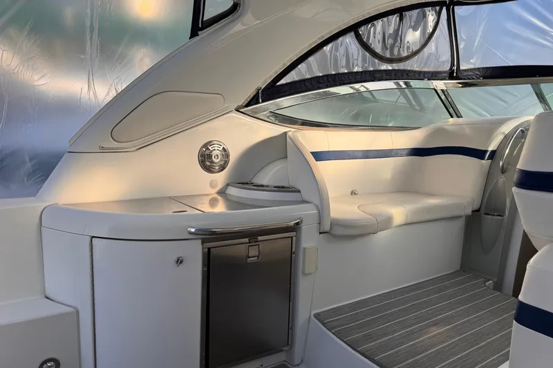 Slide: The Image of 2011 Formula 34 Performance Cruiser interior with seating and kitchenette. - 17