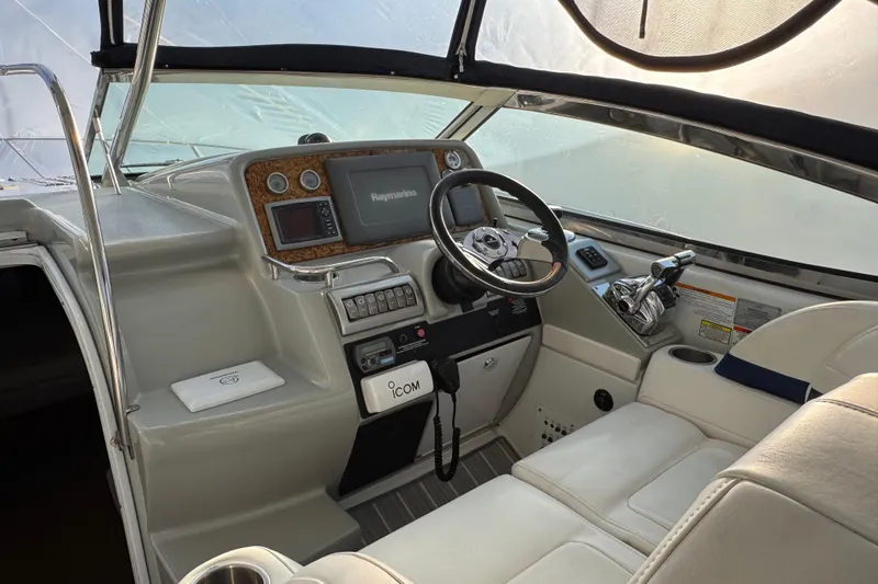 Slide: The Image of 2011 Formula 34 Performance Cruiser helm with Raymarine electronics and ICOM radio. - 20