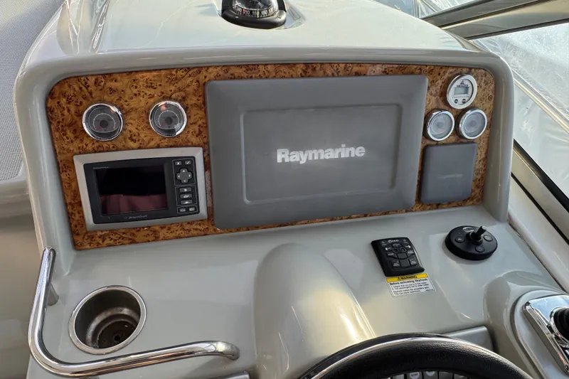 Slide: The Image of 2011 Formula 34 Performance Cruiser dashboard with Raymarine navigation system. - 21