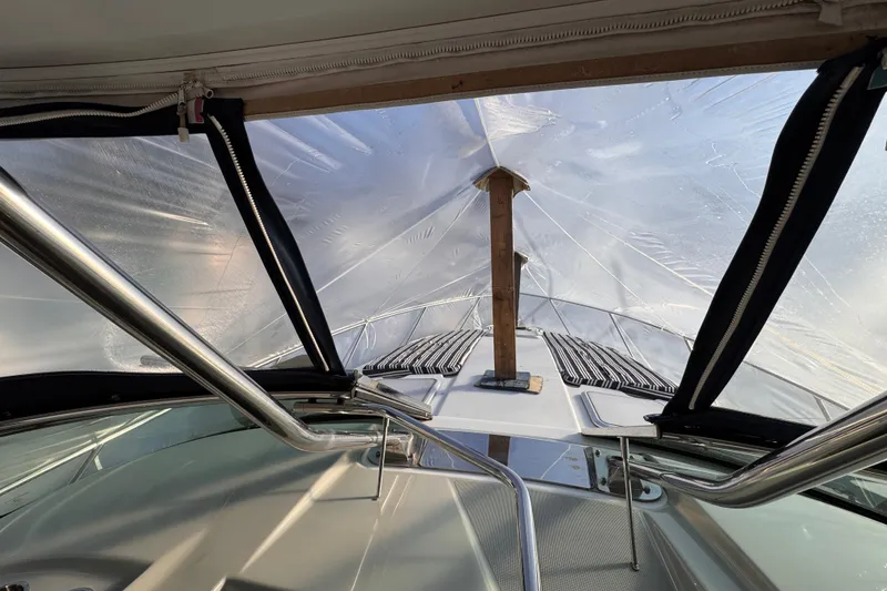 Slide: The Image of 2011 Formula 34 Performance Cruiser interior with protective cover and metal railings. - 25