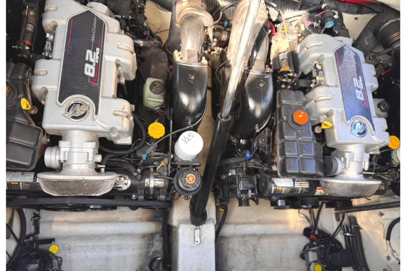 Slide: The Image of Twin MerCruiser 8.2 engines in a 2011 Formula 34 Performance Cruiser boat. - 28