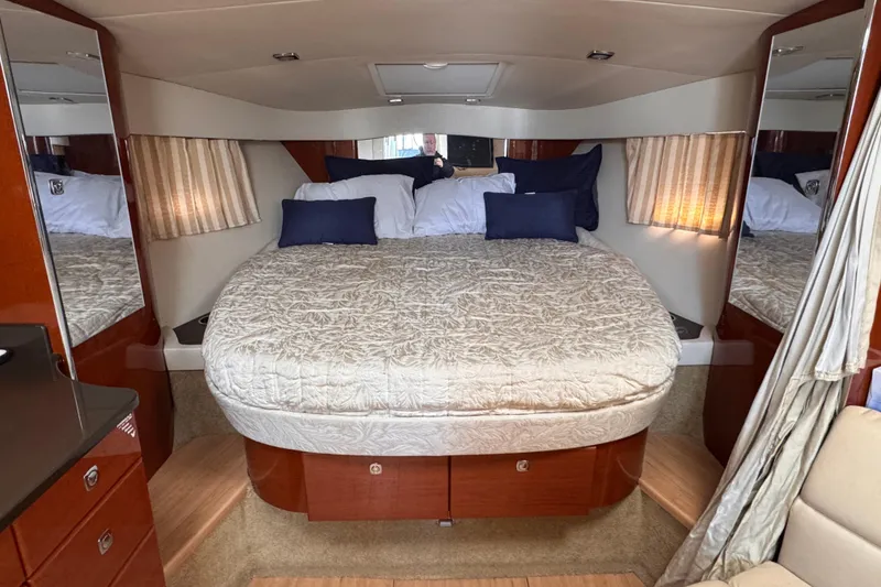 Slide: The Image of Luxurious interior of 2011 Formula 34 Performance Cruiser with cozy bed and elegant decor. - 6