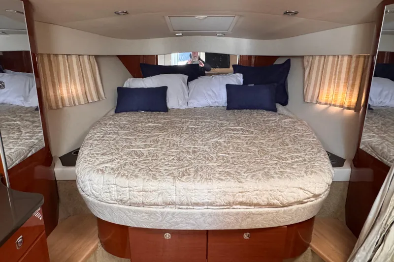 Slide: The Image of Luxurious cabin interior of 2011 Formula 34 Performance Cruiser with cozy bedding. - 8