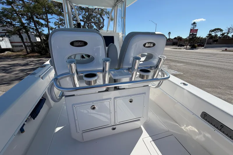 Slide: The Image of 2019 Contender 28 Tournament boat interior with rod holders and storage compartments. - 7
