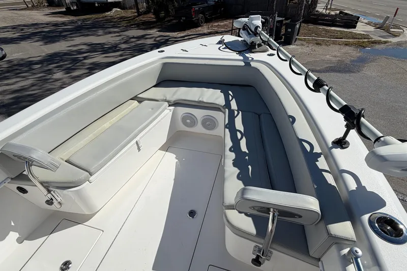 Slide: The Image of 2019 Contender 28 Tournament boat interior with cushioned seating and mounted equipment. - 9