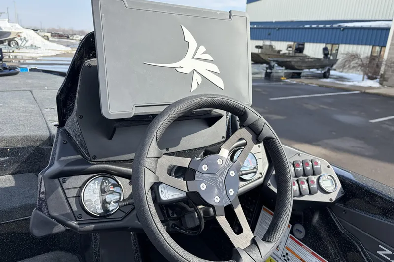 Slide: The Image of Steering console of 2026 Skeeter ZXE21 boat with modern controls and dashboard. - 12