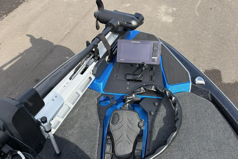 Slide: The Image of 2026 Skeeter ZXE21 boat dashboard with advanced navigation and control systems. - 19