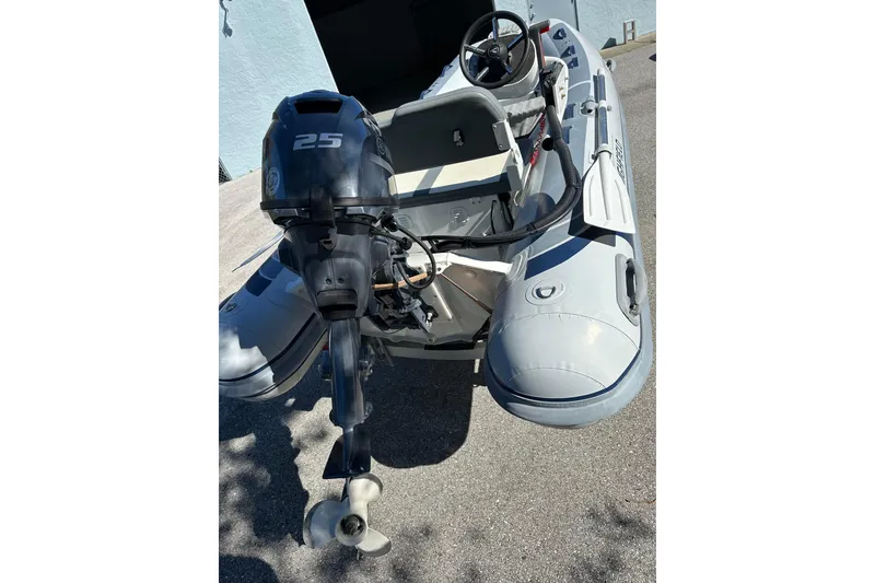 Slide: The Image of 2023 Highfield Classic 340 FCT inflatable boat with 25 HP outboard motor. - 5