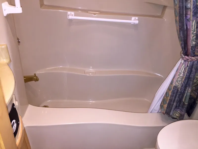 Slide: The Image of Bathroom in a 1999 Bluewater 5800 boat. - 30