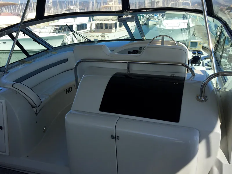 Slide: The Image of Interior of a 1999 Bluewater 5800 yacht docked at marina. - 34