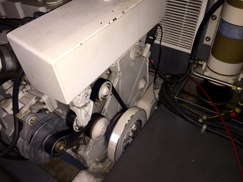 Slide: The Image of Engine room of a 1999 Bluewater 5800 with belt drive. - 48