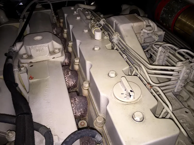 Slide: The Image of Engine of a 1999 Bluewater 5800, close-up view. - 49