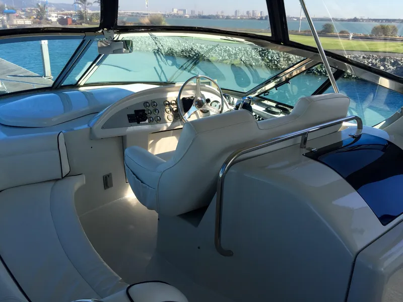 Slide: The Image of Interior of a 1999 Bluewater 5800 yacht with helm station. - 9