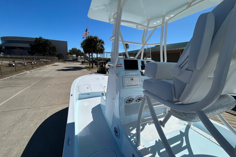 Slide: The Image of 2026 Shallow Sport 25 X3 boat with sleek design and modern seating. - 20