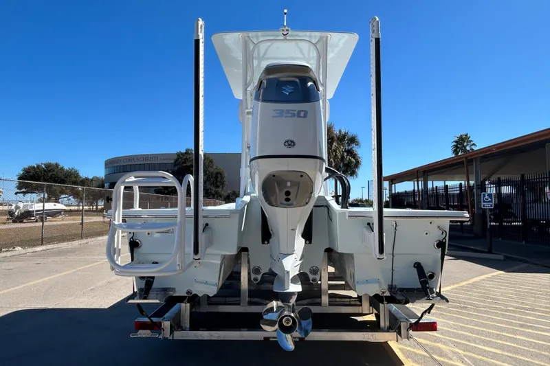 Slide: The Image of 2026 Shallow Sport 25 X3 boat with powerful 350 engine, rear view. - 5