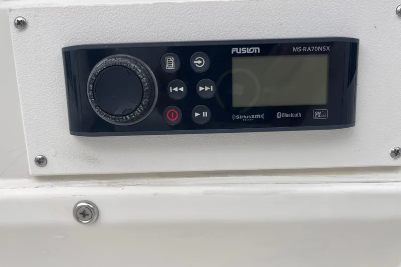 Slide: The Image of Control panel of a Fusion MS-RA70NSX stereo system on a 1995 Wahoo 2100 EFS boat. - 18