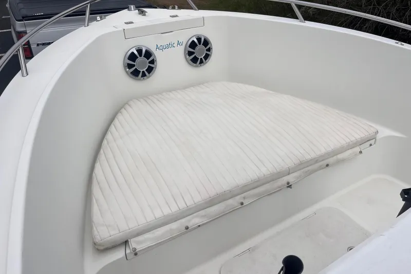 Slide: The Image of 1995 Wahoo 2100 EFS boat with cushioned seating and Aquatic AV speakers. - 5