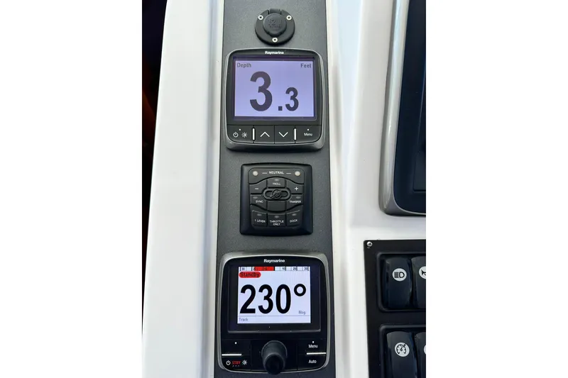 Slide: The Image of Cozy cabin interior of 2016 Beneteau Swift Trawler 34 with comfortable bedding. - 22