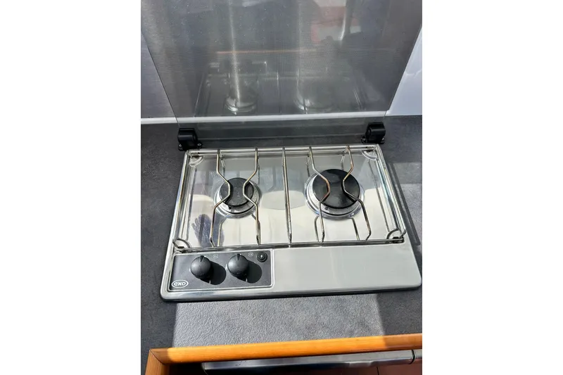 Slide: The Image of Two-burner stove on 2016 Beneteau Swift Trawler 34 yacht kitchen. - 57