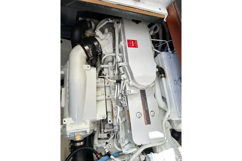Slide: The Image of Engine of 2016 Beneteau Swift Trawler 34, showcasing detailed mechanical components. - 60