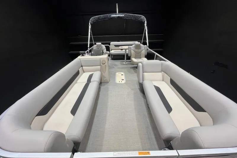 Slide: The Image of 2023 Princecraft Vectra 23 pontoon boat interior with spacious seating and modern design. - 7